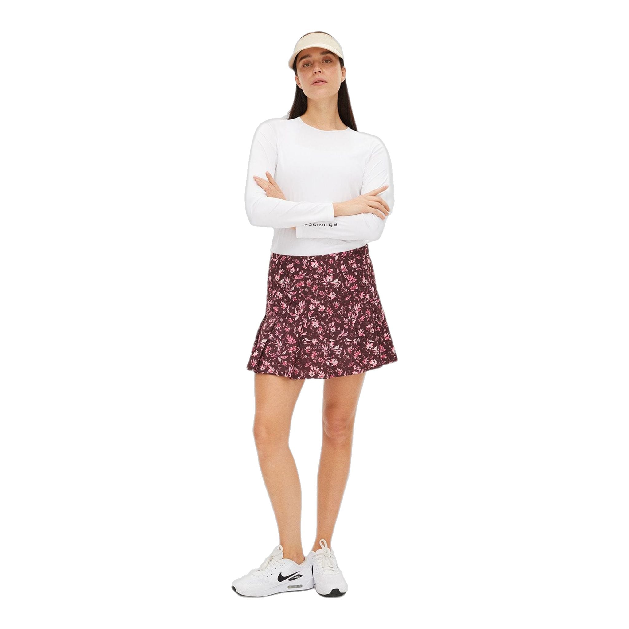 Jupe de golf Röhnisch Lily à plis réguliers, rose fluo à fleurs, pour femme