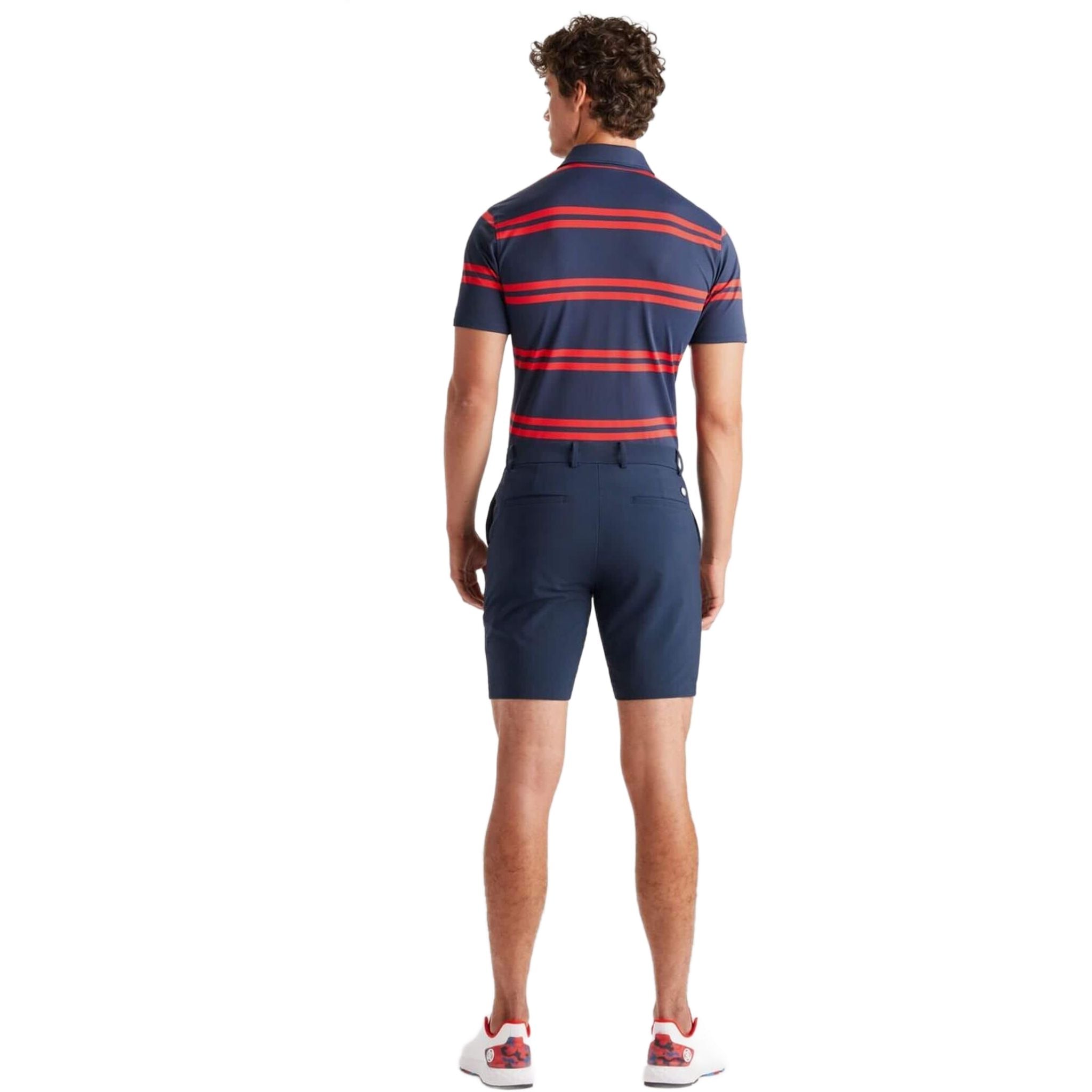 Polo homme GFORE à rayures décalées en piqué technique, coupe ajustée