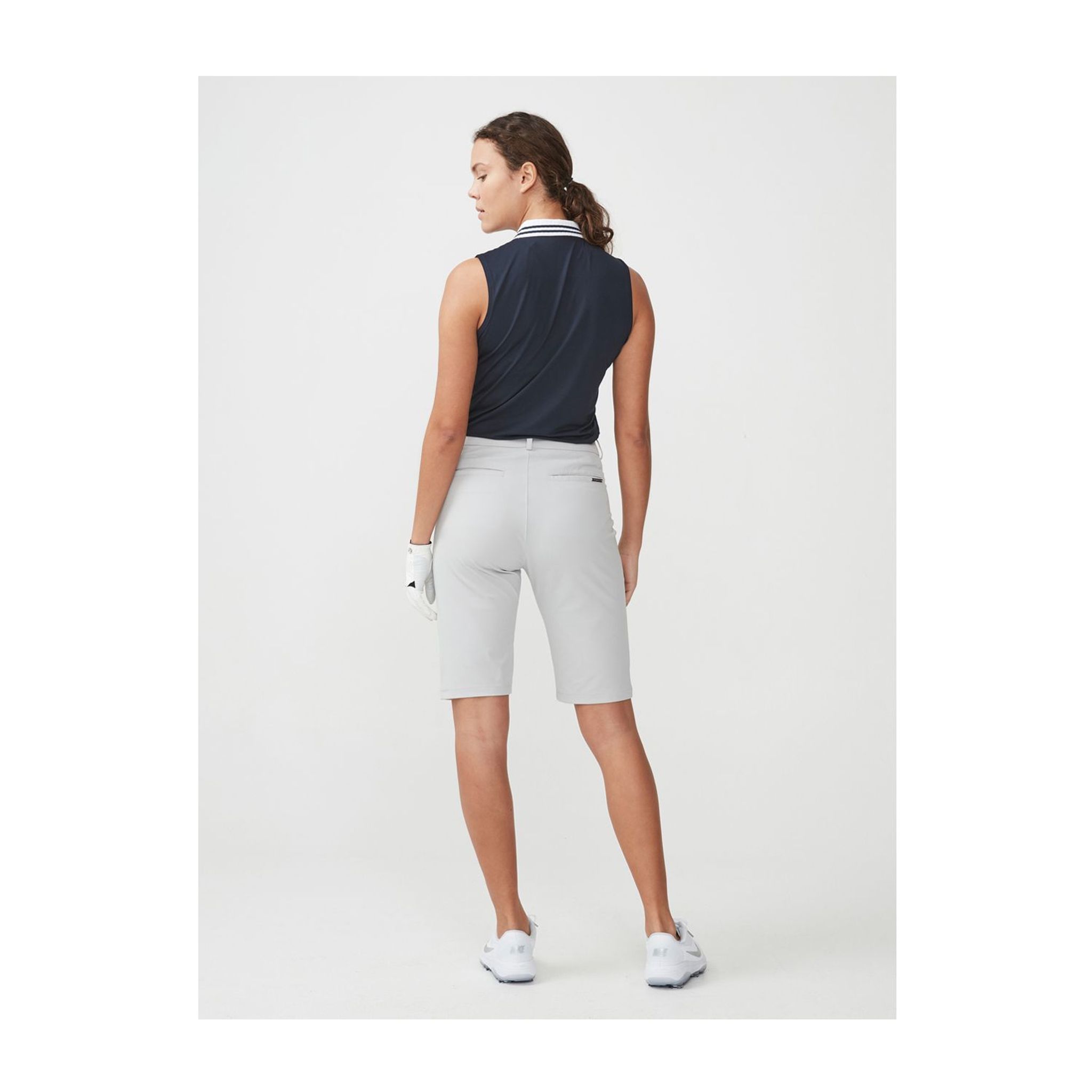 Polo rayé sans manches Röhnisch bleu marine pour femme