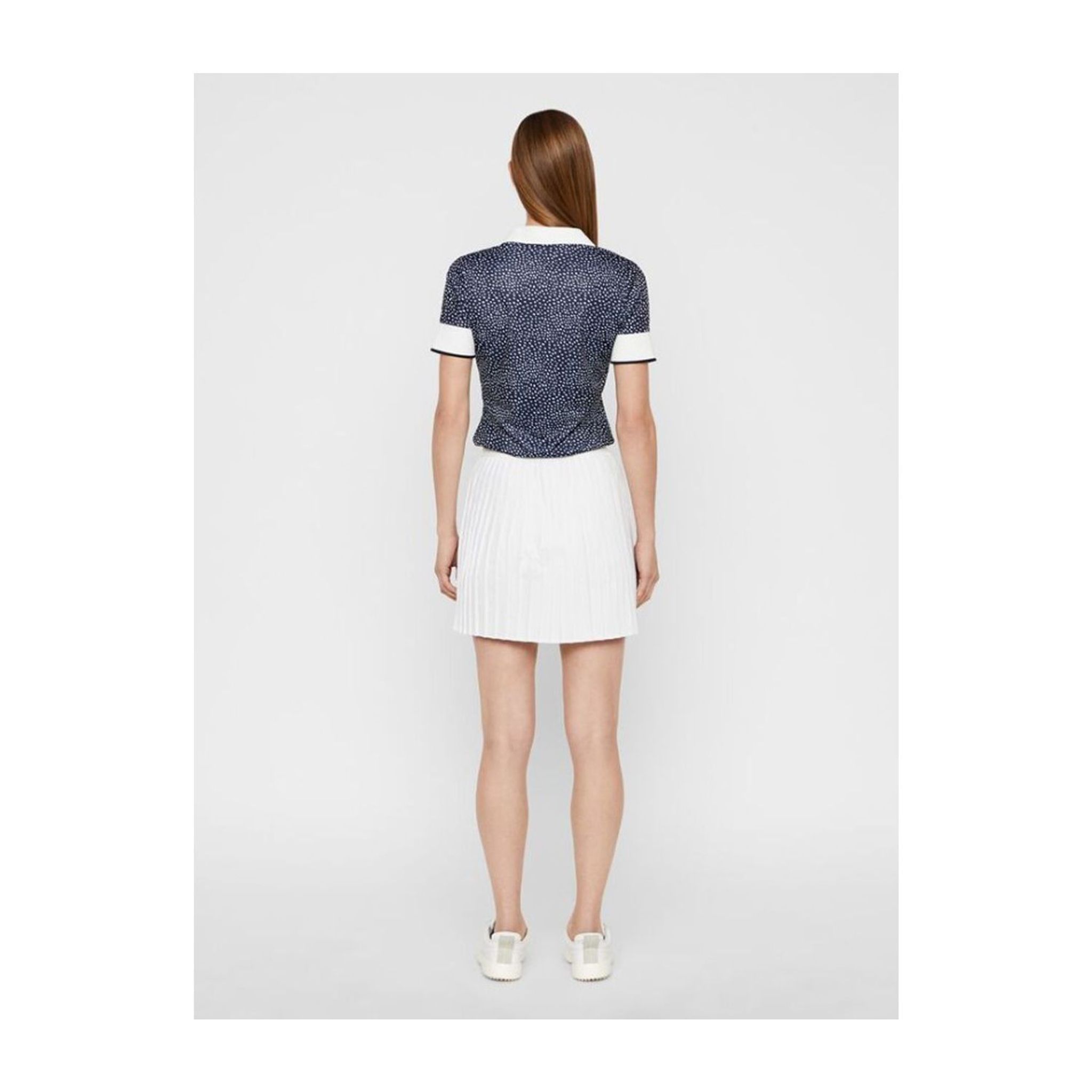 Polo Coolmax W Lexie-TX de J. Lindeberg pour femme à pois blancs