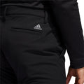 Pantalon de golf isolé Adidas Frost Guard pour homme