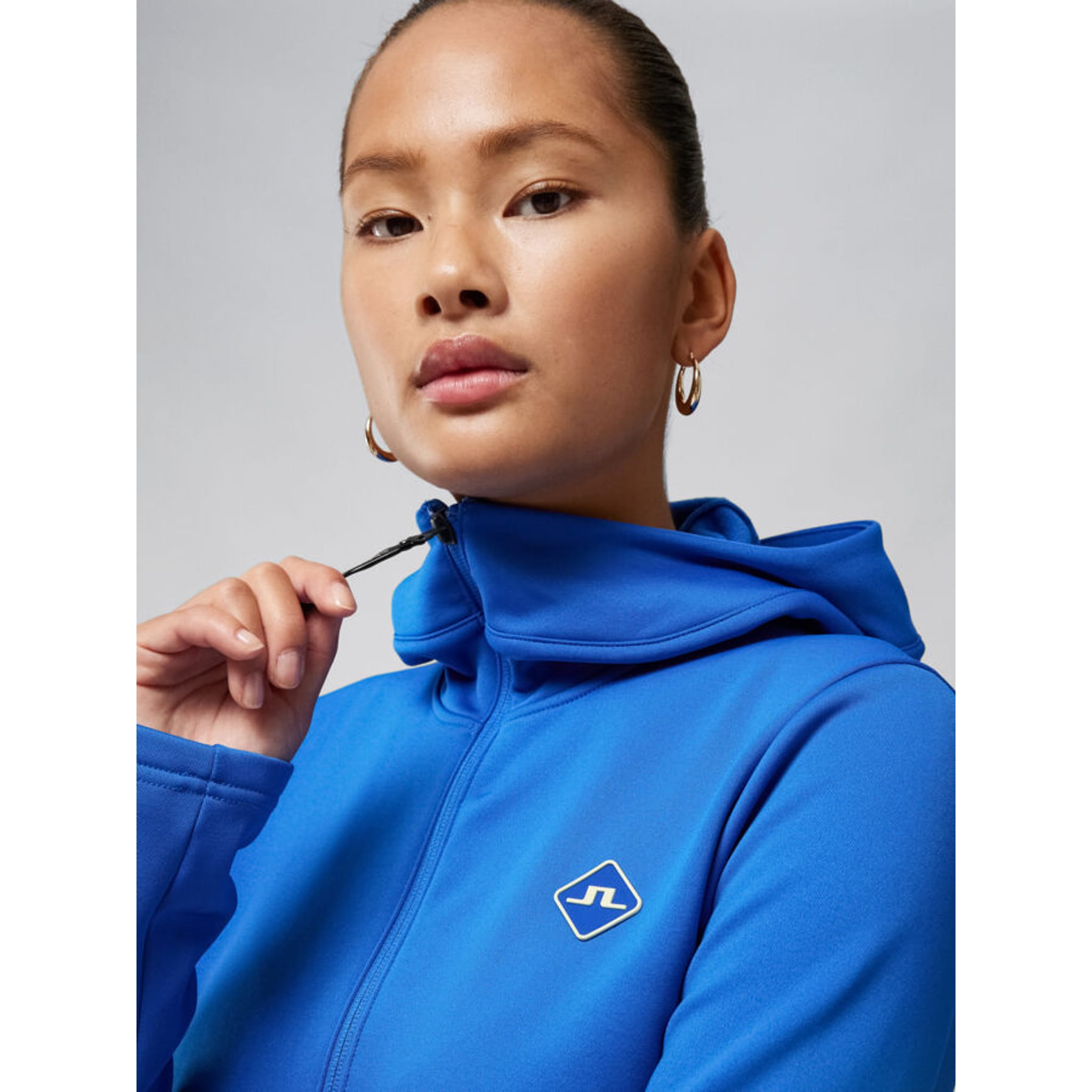 Pull de golf à capuche aérienne J. Lindeberg Bleu nautique Femme Femme